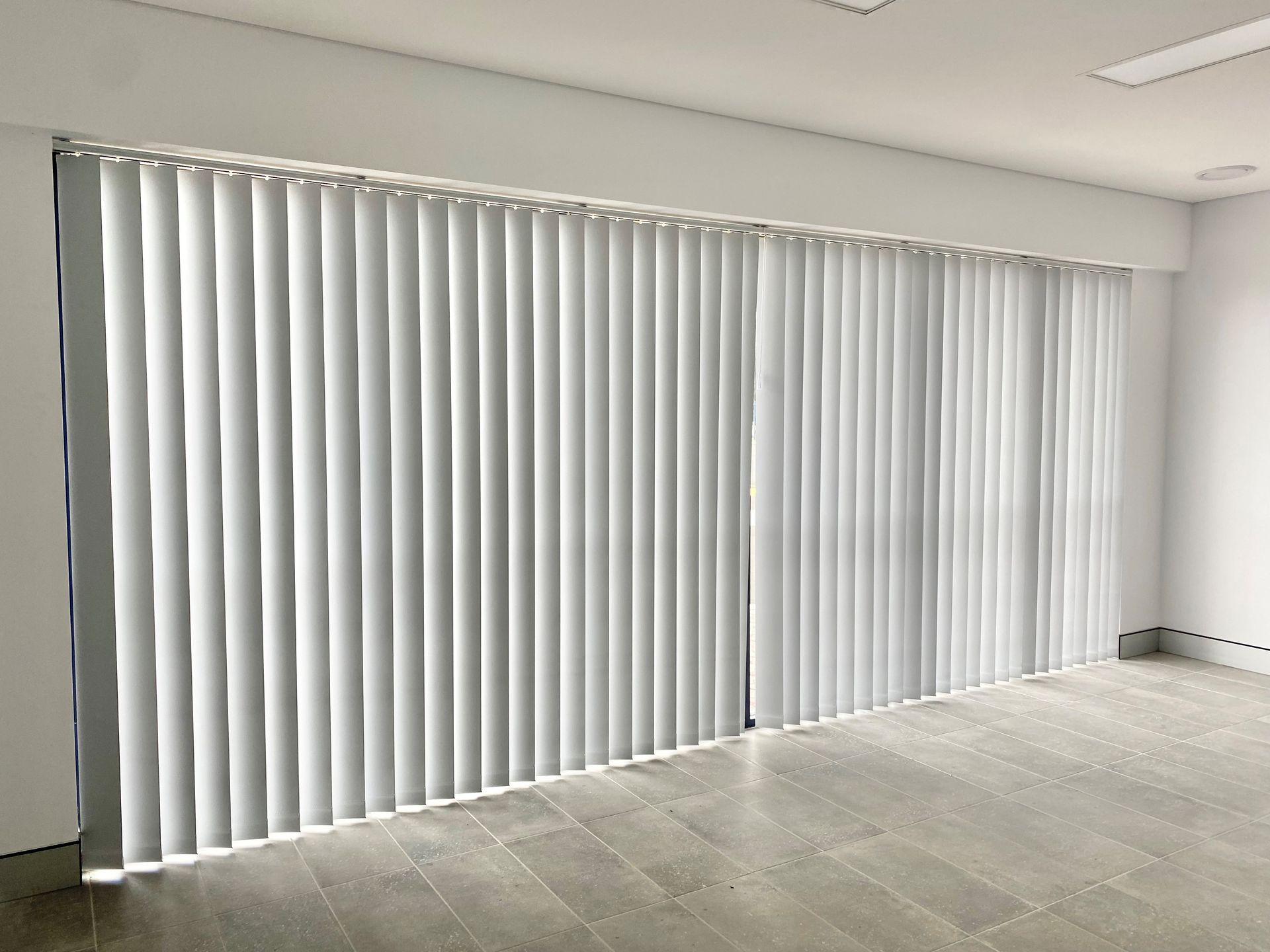 vertical drapes on a large sliding door
