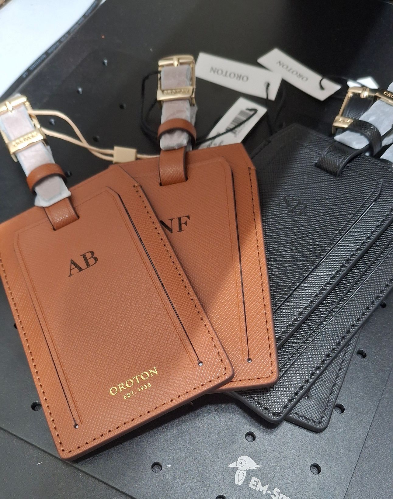 Two Brown Personalised Wallets — NMTG Engraving in Austinmer, NSW