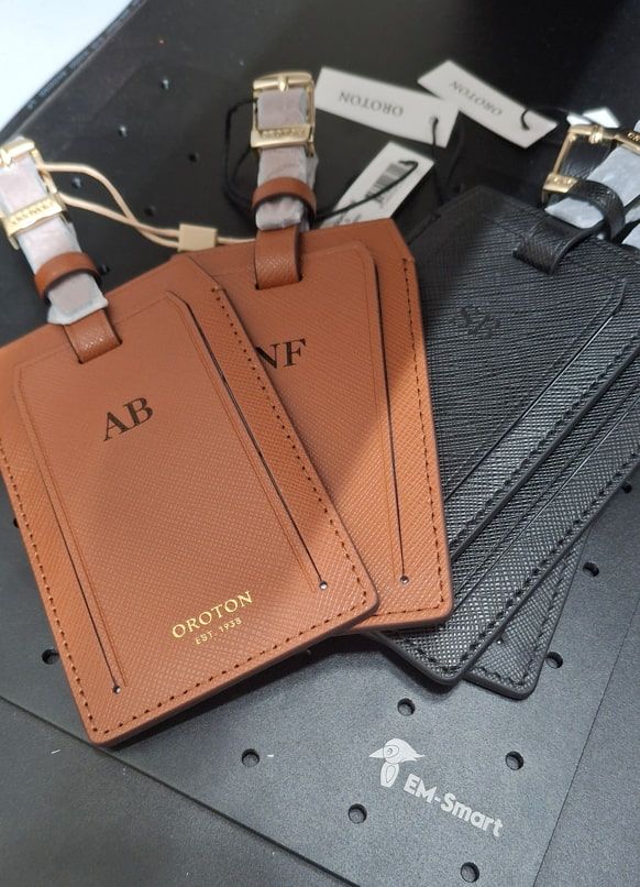 Two Brown Leather Wallets With Personalised Initials Engraved — NMTG Engraving in Wollongong, NSW