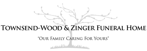 Logo for Townsend-Wood & Zinger Funeral Home, featuring a tree graphic and text