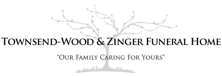Logo for Townsend-Wood & Zinger Funeral Home, featuring a tree graphic and text