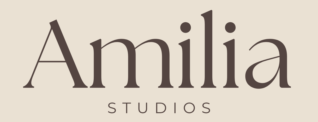 Amilia Studios logo in brown serif text on a beige background