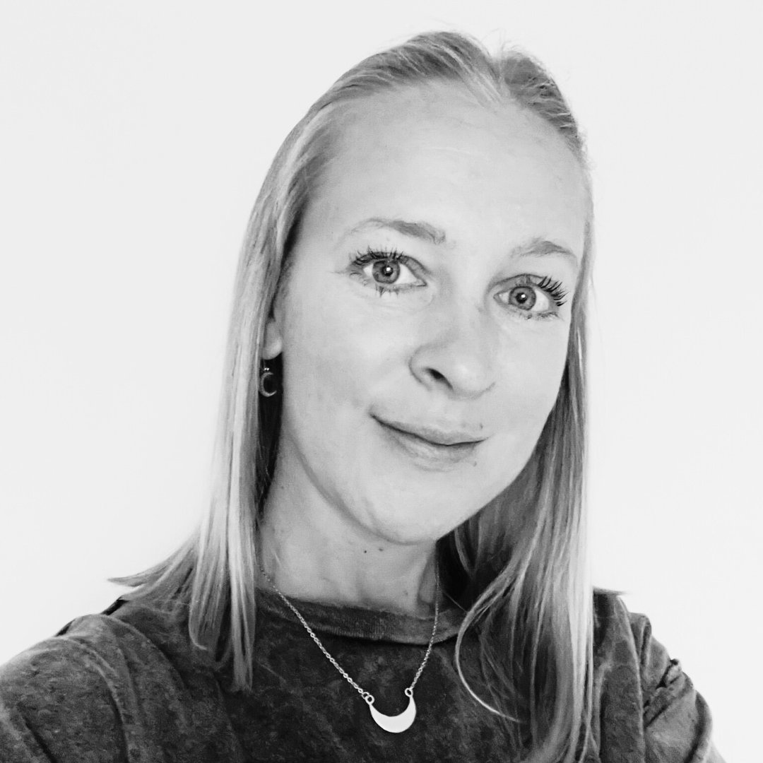 Black and white headshot of Claire, reformer Pilates instructor at Amilia Studios