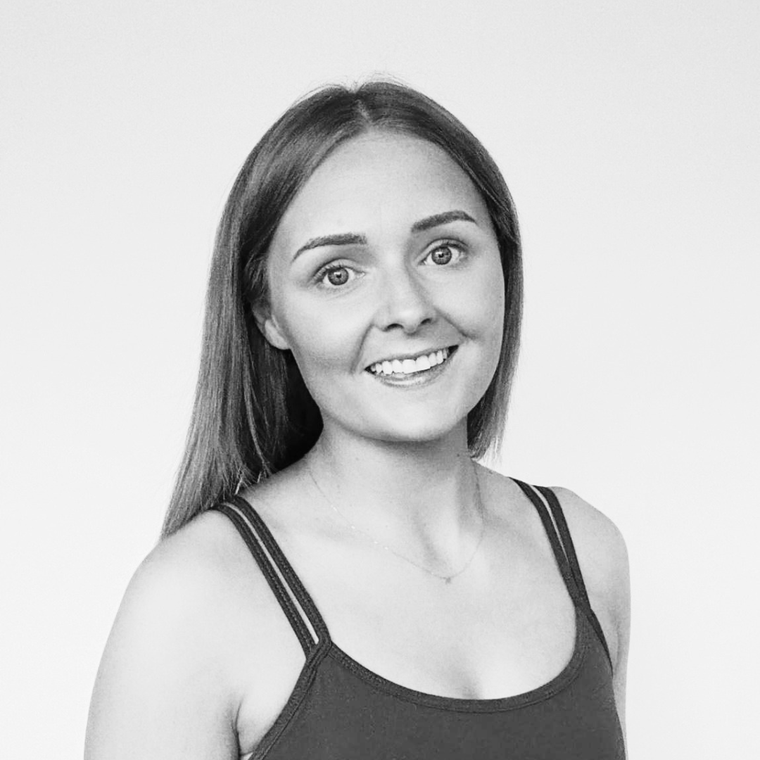 Black and white headshot of Kiera, reformer Pilates instructor at Amilia Studios
