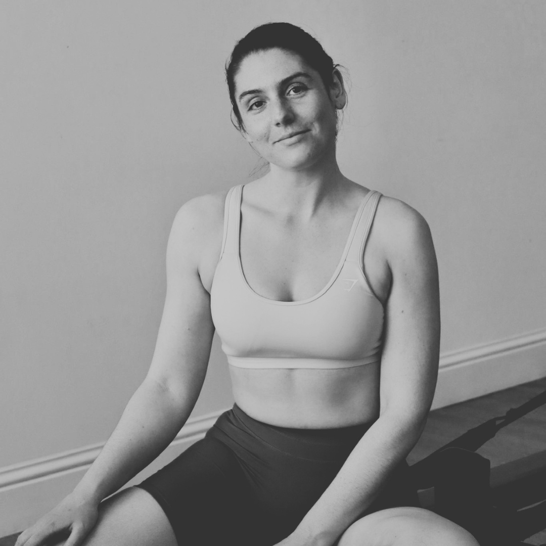 Black and white headshot of Ashleigh, reformer Pilates instructor at Amilia Studios