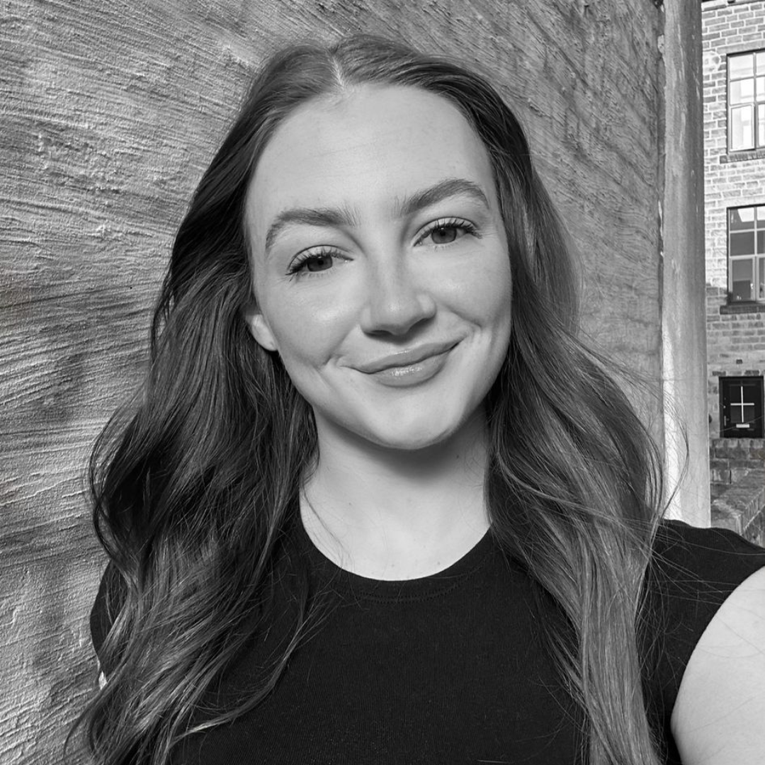 Black and white headshot of Anna-Maria, reformer Pilates instructor at Amilia Studios