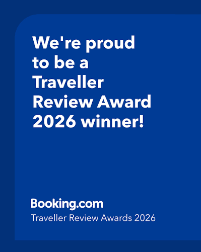 Blue Booking.com award graphic reading “We’re proud to be a Traveller Review Award 2026 winner!”