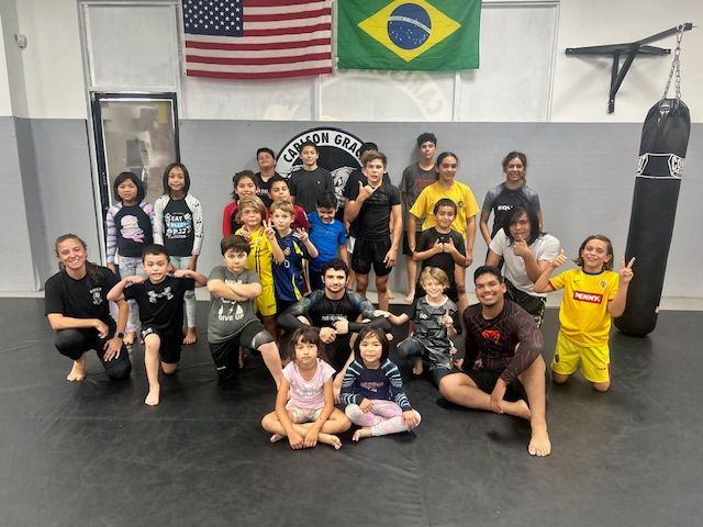 A group of Jiu-Jitsu fighters are taking martial arts classes at Gracie Jiu-Jitsu Team in Riverside, CA. A group of Jiu-Jitsu fighters are taking martial arts classes at Gracie Jiu-Jitsu Team in Riverside, CA.