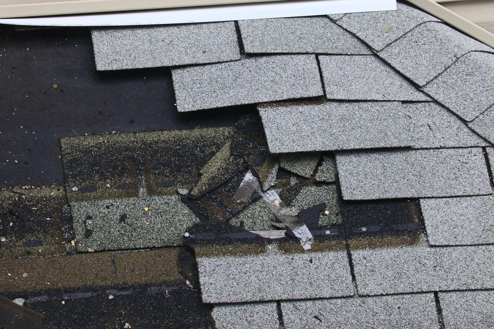 A close up of a roof with a hole in it