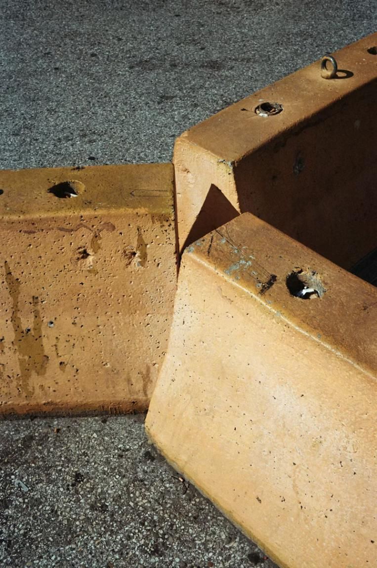 A Close Up of a Concrete Block With Holes in It — Tiger Concrete ACT In Fadden, ACT