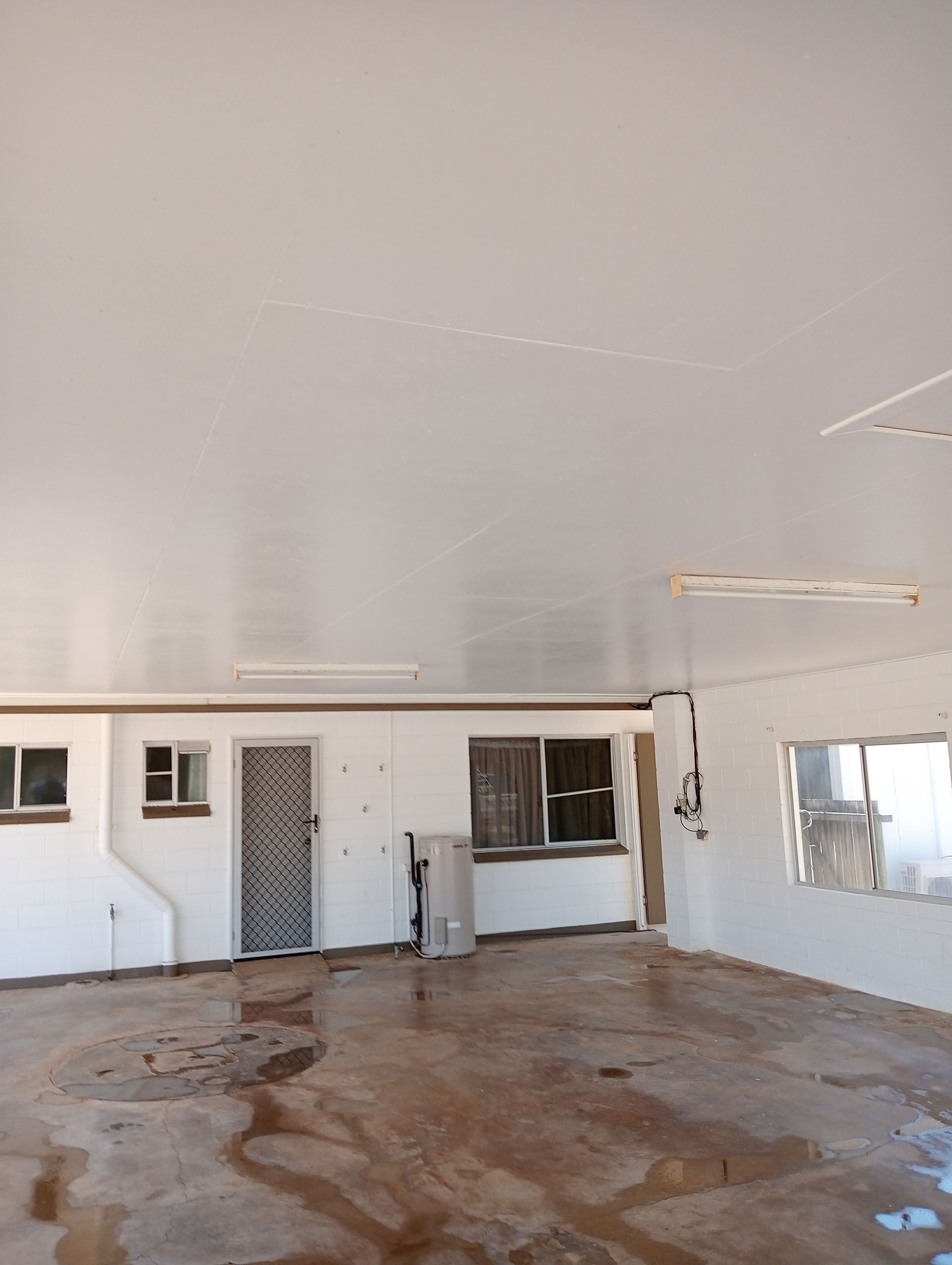 Empty White-walled Room With a Damaged — All Sparkles Cleaning Technology In Bowen, QLD