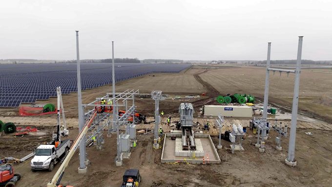 Drone progress photo of a substation and solar project under construction in Ohio, with crews and equipment on site