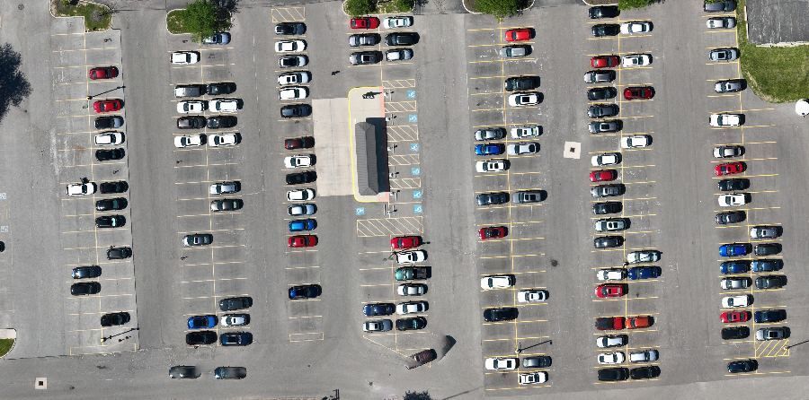 Same shuttle lot at 4 p.m., starting to empty
