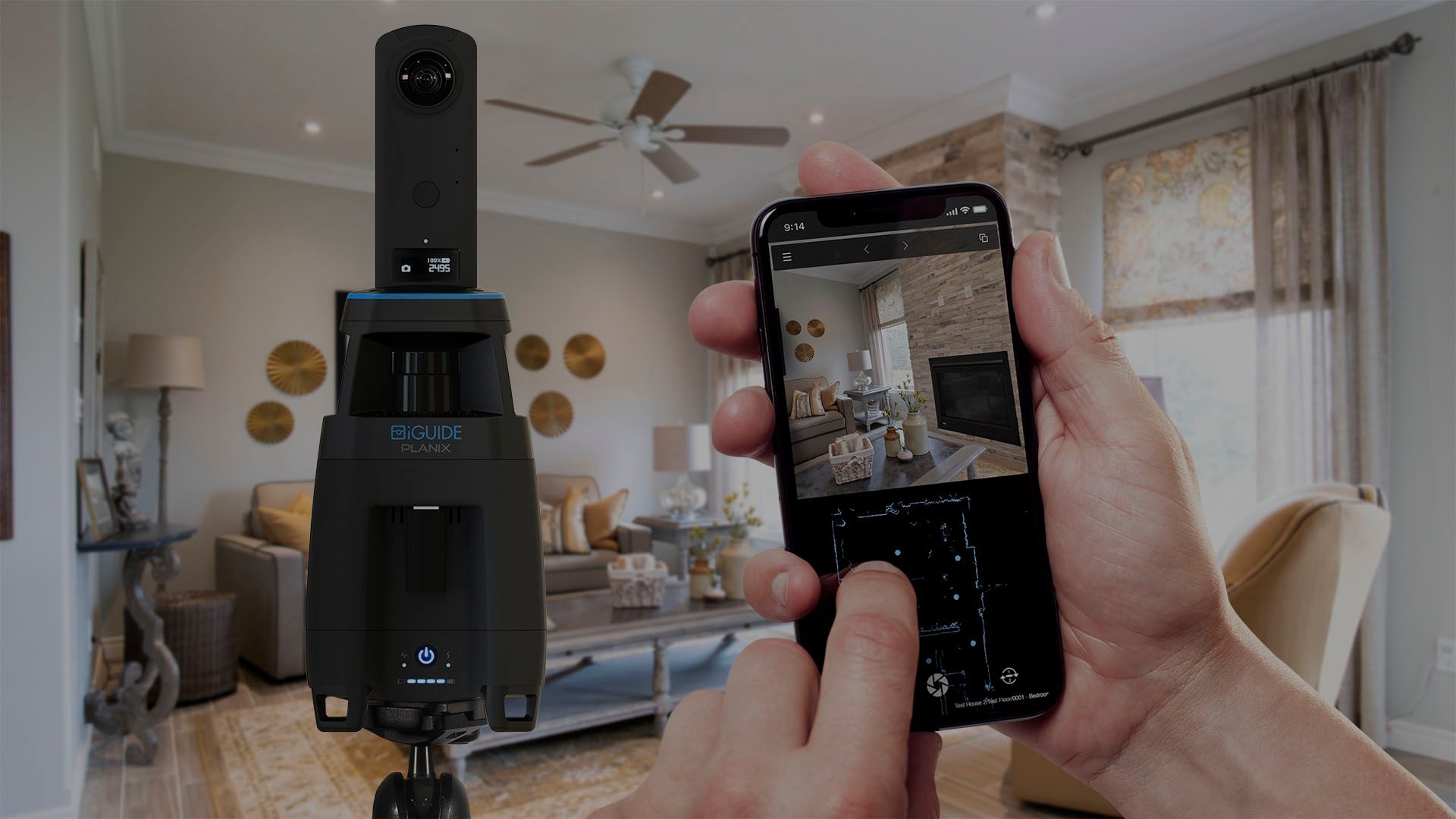 Person holding a smartphone to view a living room through a small black camera device.