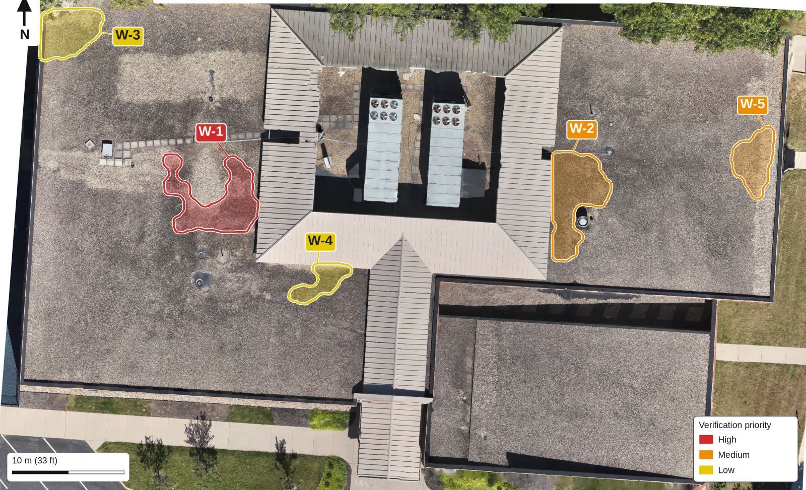 Aerial map of a school roof with five outlined suspect areas labeled W-1 through W-5 and colored red, orange and yellow by verification priority.