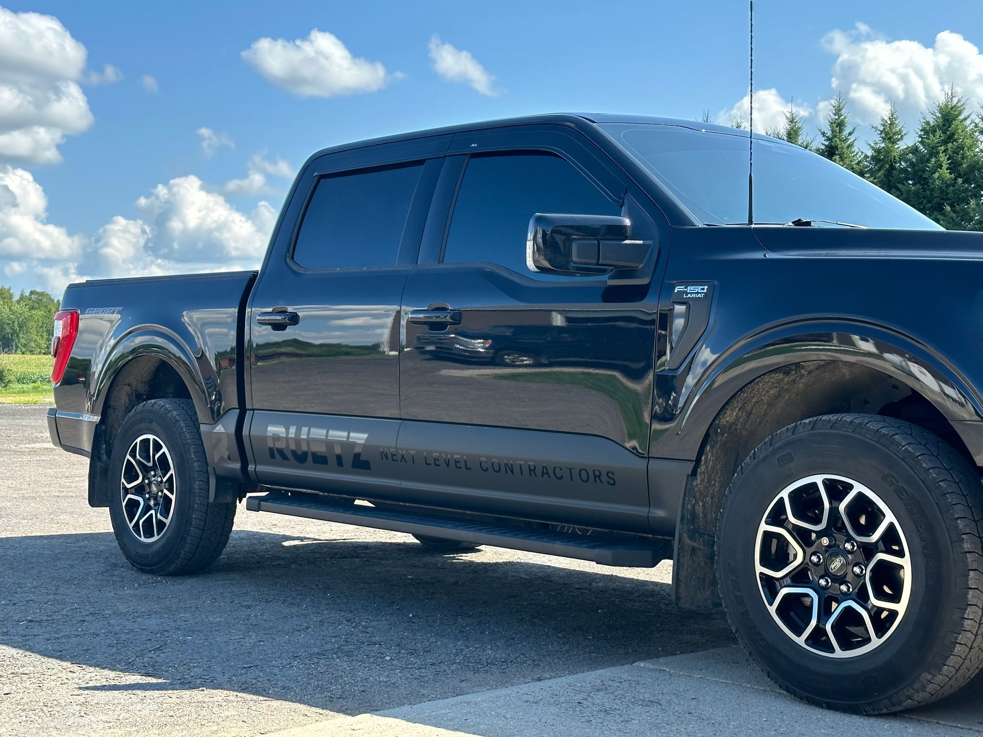 Black pickup truck parked outdoors with