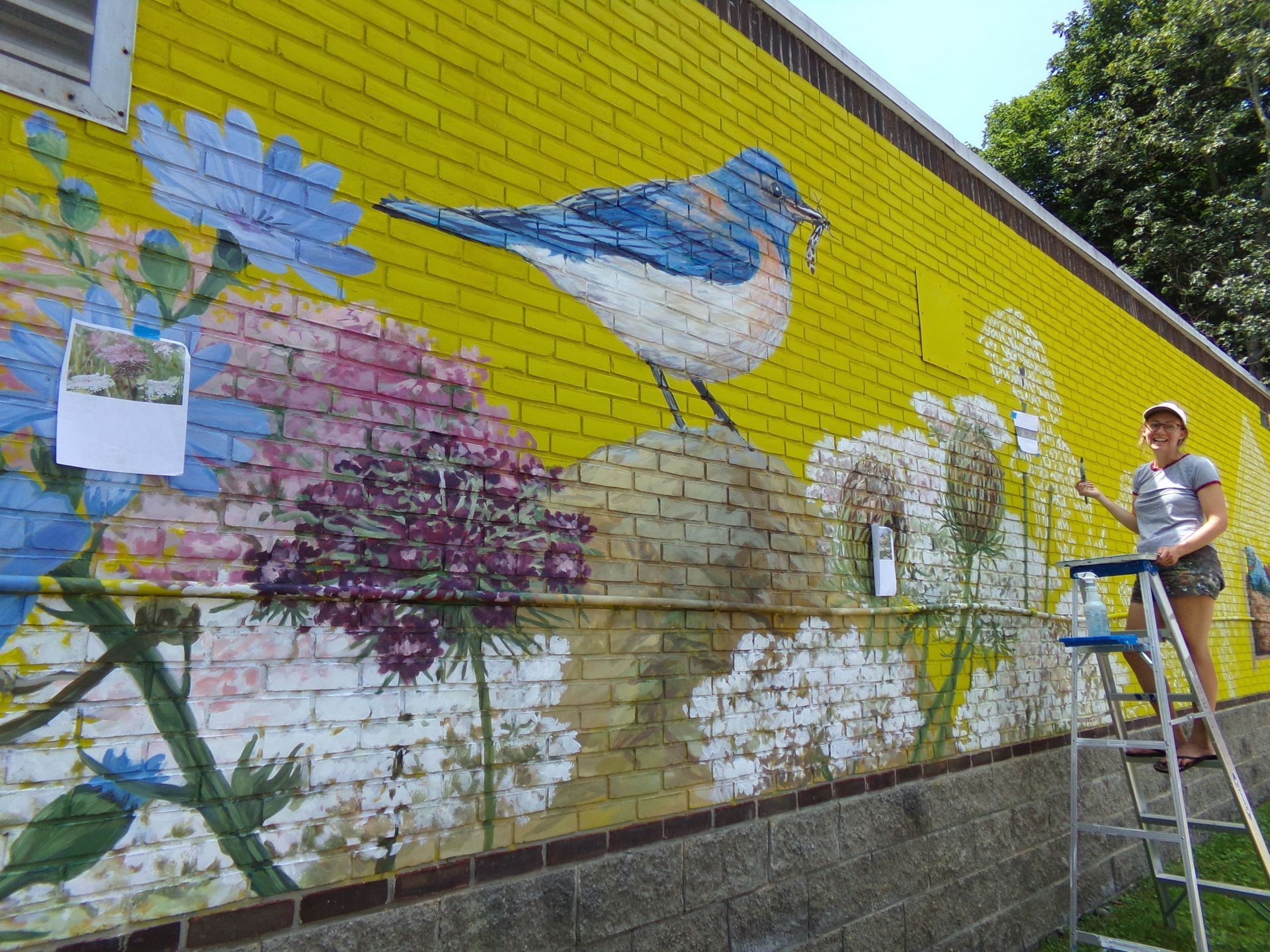 Chloe Smith paints new outdoor mural in Alfred, NY