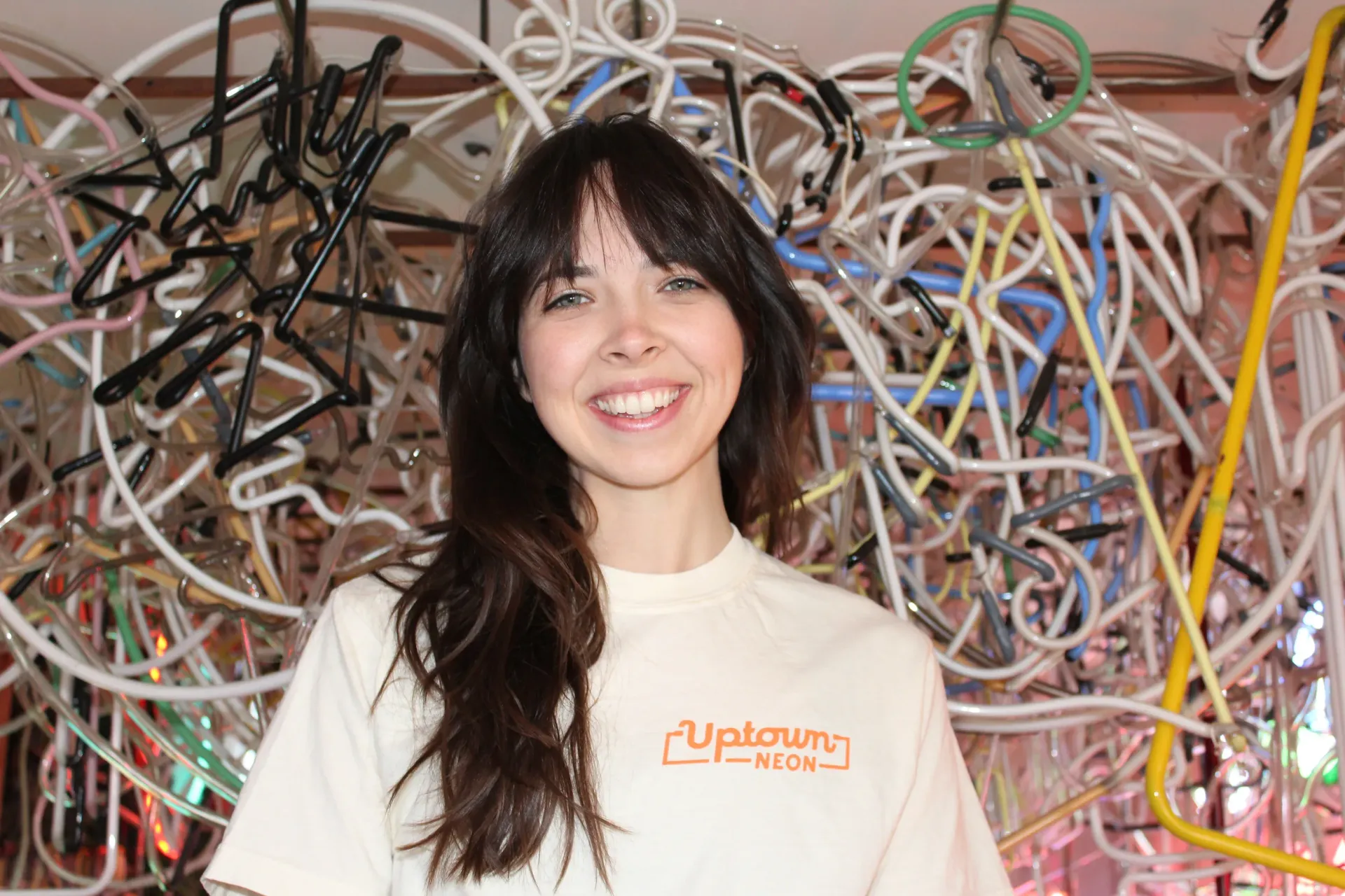 Chloe Kottwitz in Uptown Neon shop, located in Richmond, Virginia.