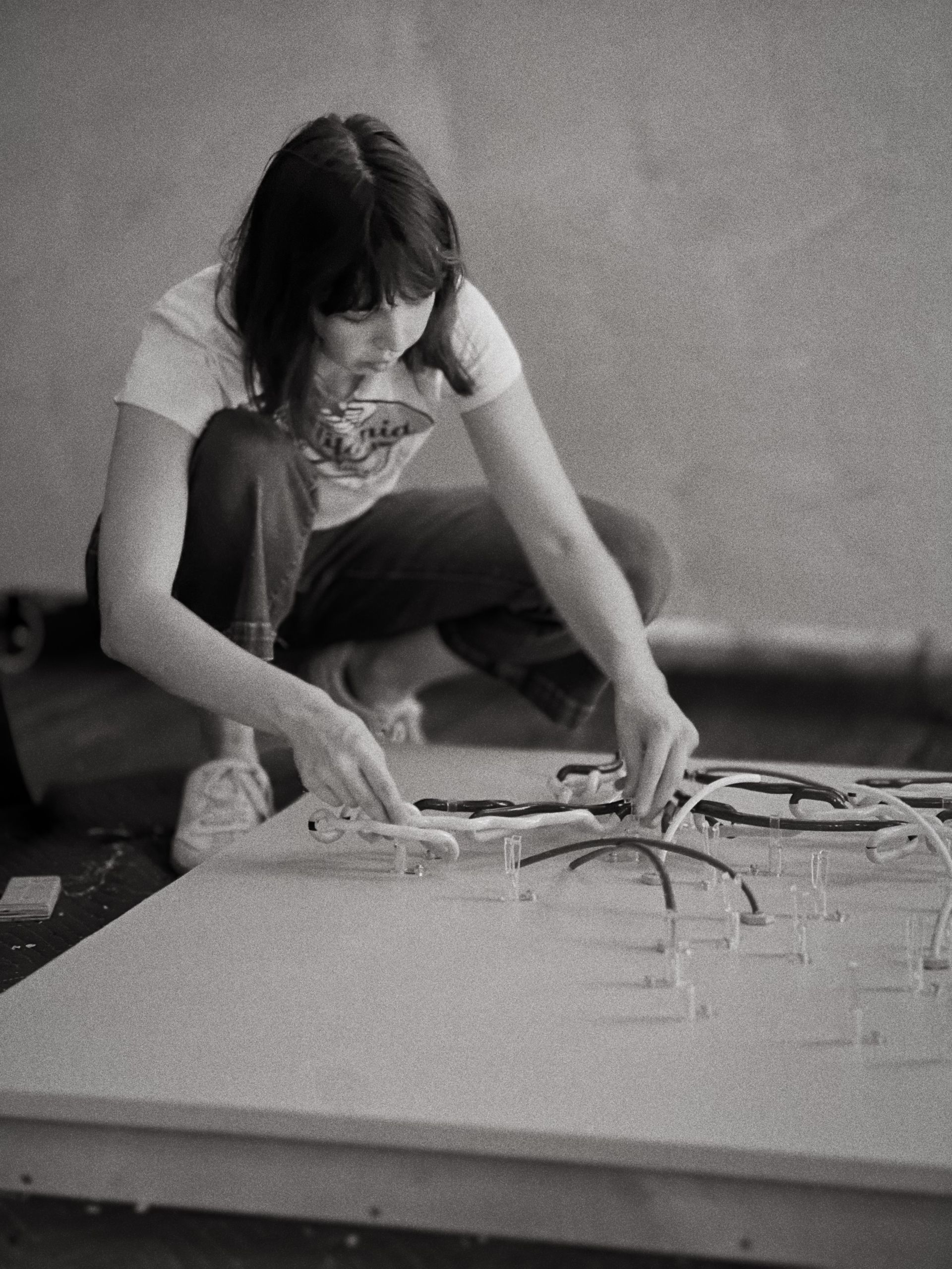 Chloe mounting neon artwork.
