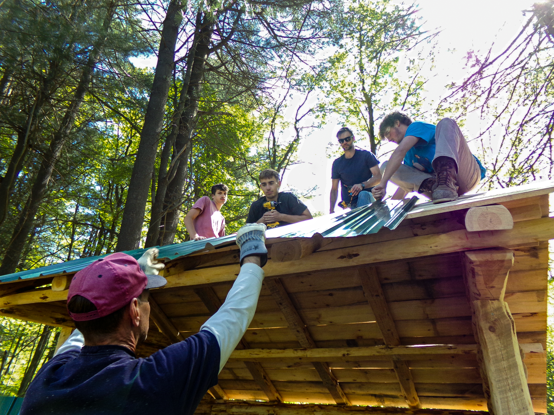 Volunteers building a trail shelter.
