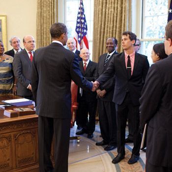 Paul Ronan shaking hands with President Obama in the Oval Office