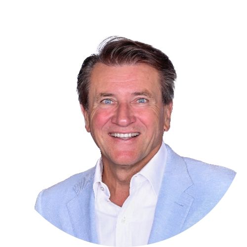  Robert Herjavec smiling in a light blue blazer, keynote speaker for Tech Day 2023 cybersecurity event.