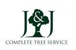 Logo for J&J Complete Tree Service with a green tree silhouette and serif text on white background