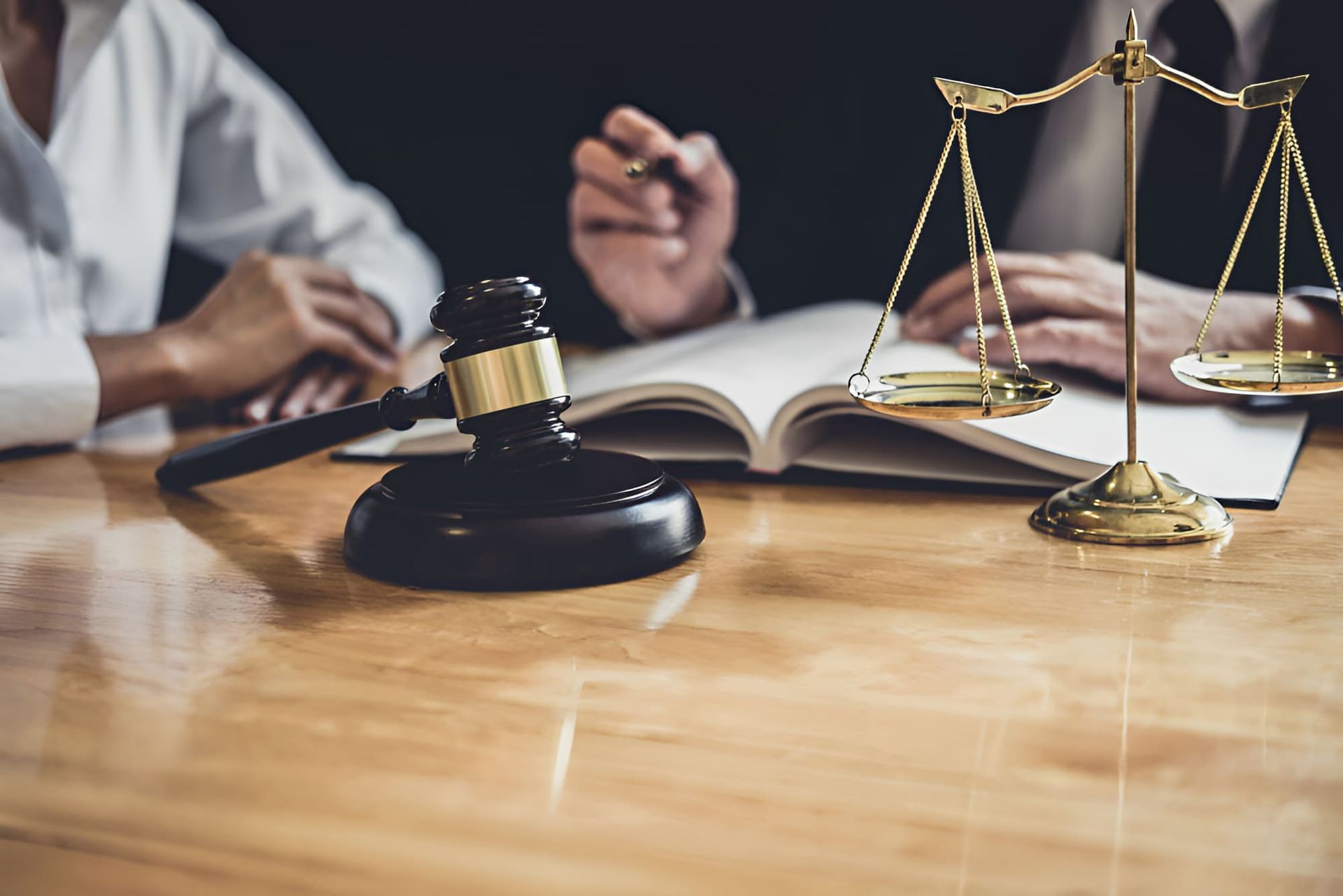 A Judge's Gavel And Scales Of Justice Are On A Wooden Table — De Silva Hebron In Darwin City, NT