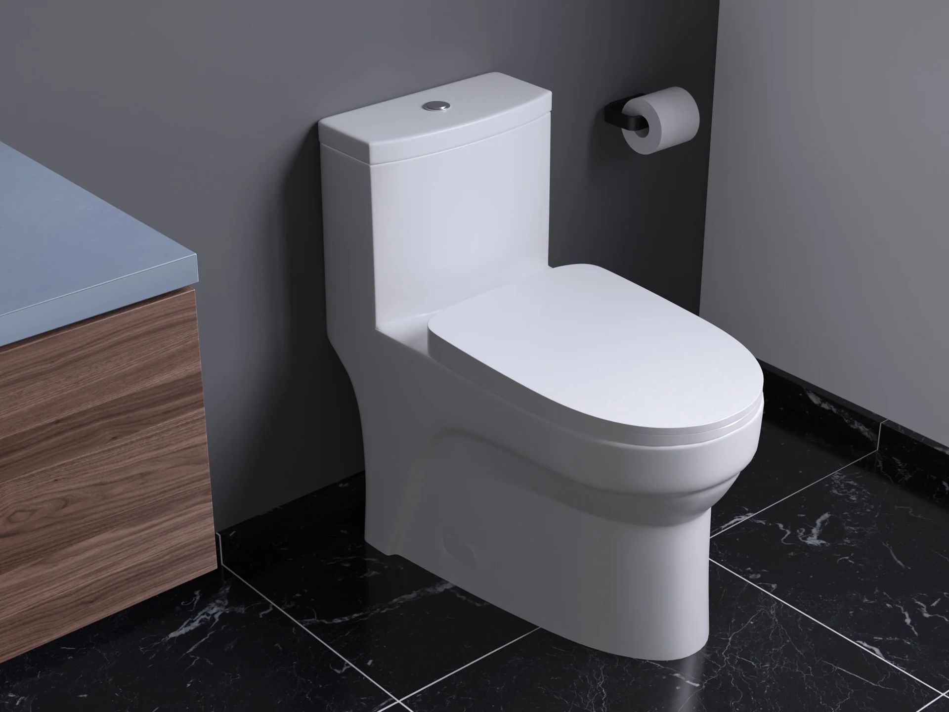 A white, modern, one-piece toilet sits on a black tile floor next to a wood vanity and a toilet paper holder.