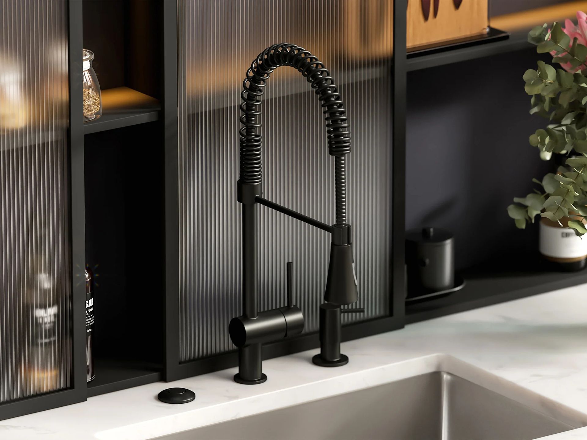 A matte black, spring-neck pull-down kitchen faucet installed on a white countertop in front of fluted glass shelving.