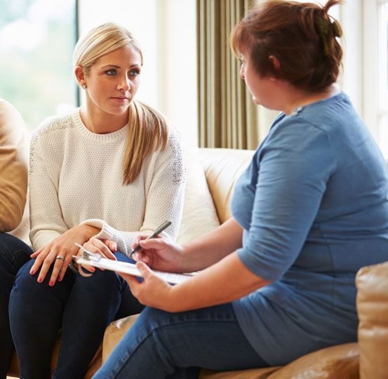 woman talking with therapist