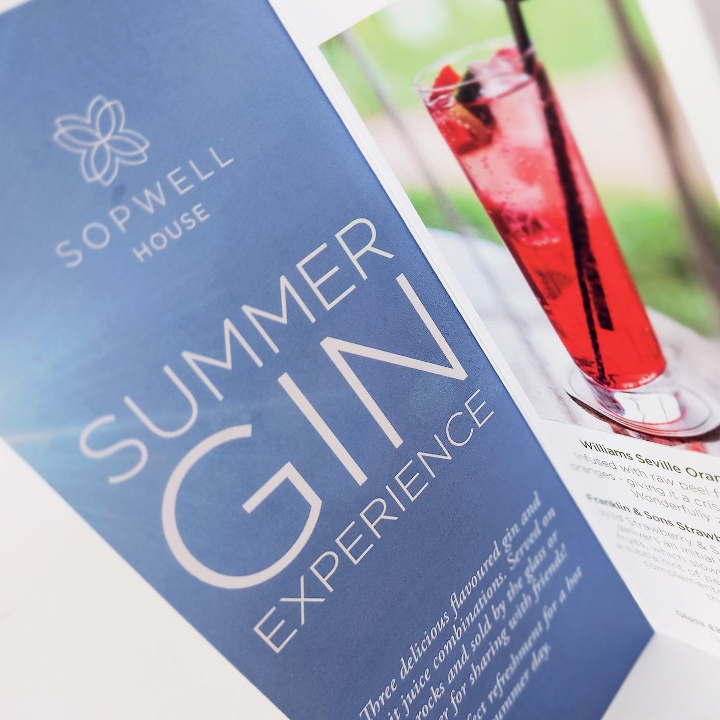 Leaflet for Sopwell House's Summer Gin Experience, with a cocktail and logo on blue background.