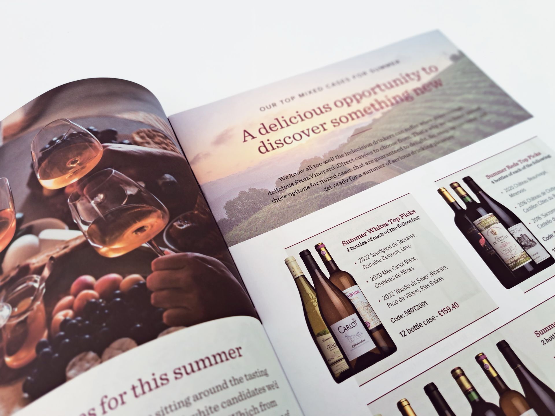 Open magazine spread; wine glasses and bottles with text, 