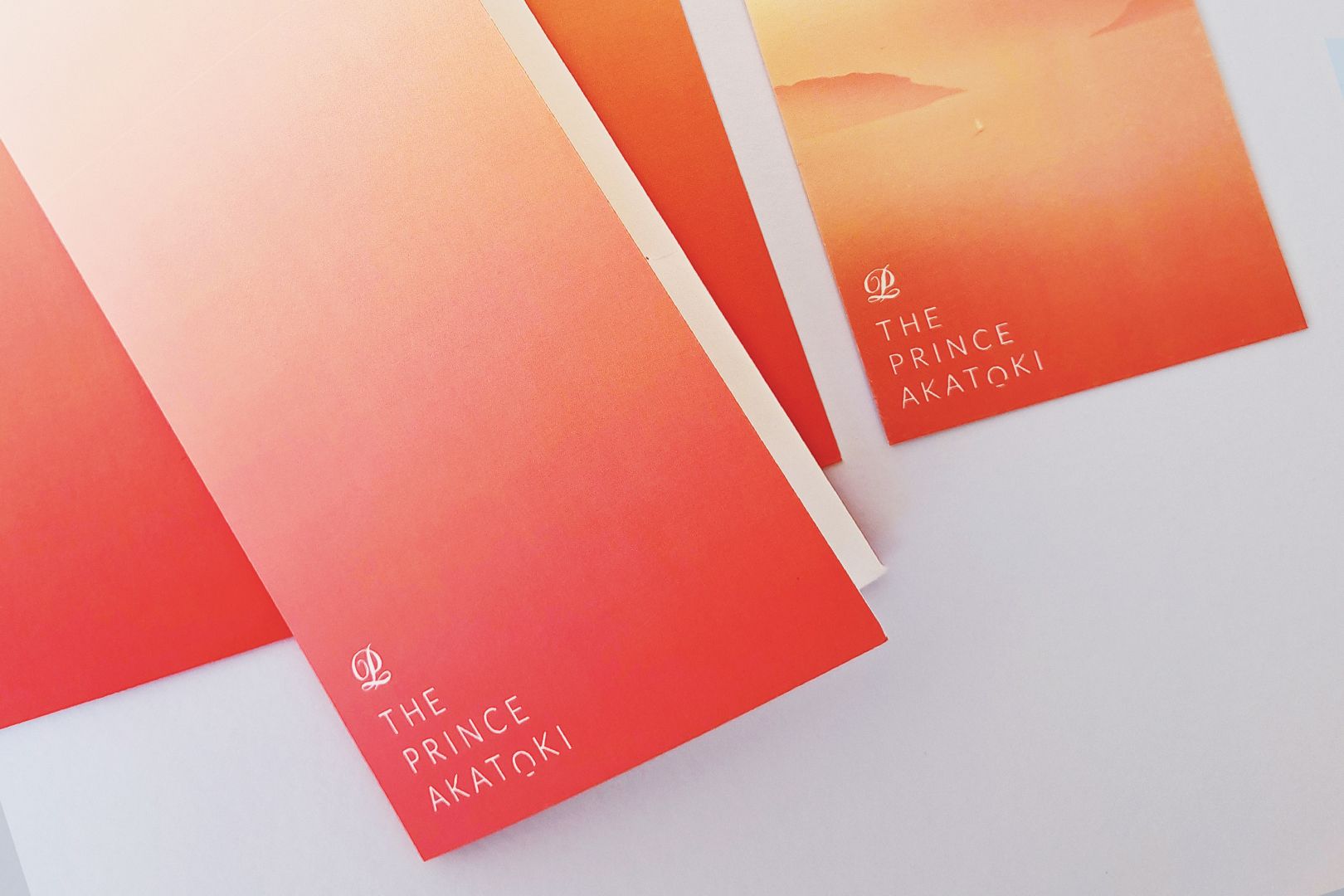 Cards with a red and orange gradient, with