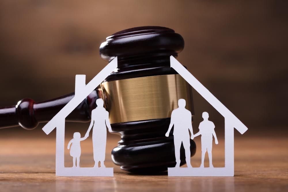 A Paper Cut Out Of A Family And A House — Clarence Valley Legal In Grafton, NSW