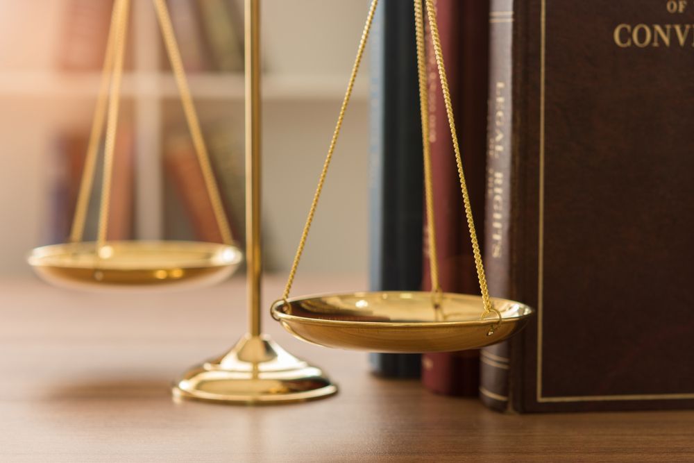 A Pair Of Scales Of Justice Sitting — Clarence Valley Legal In Grafton, NSW