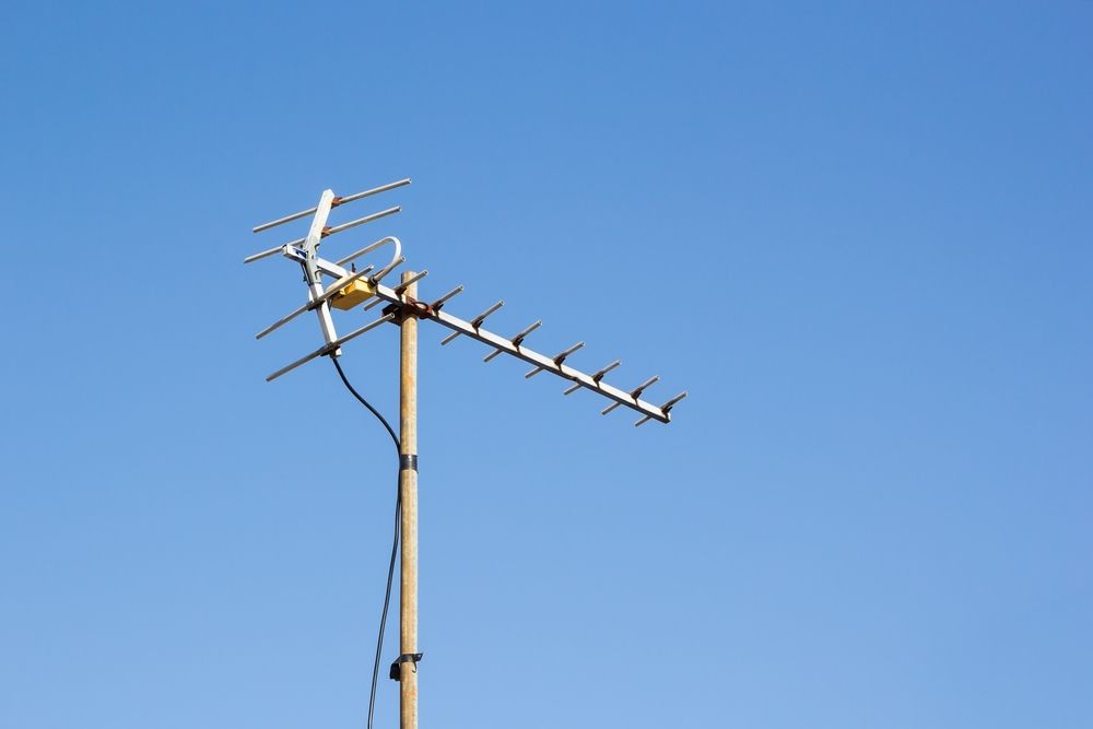 An Antenna on A Pole with A Blue Sky in The Background — A1 Antenna Doctor In Port Macquarie, NSW