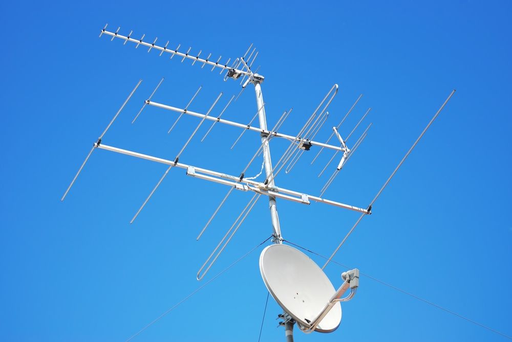 A Large Antenna and Satellite Dish Against a Blue Sky — A1 Antenna Doctor In Port Macquarie, NSW