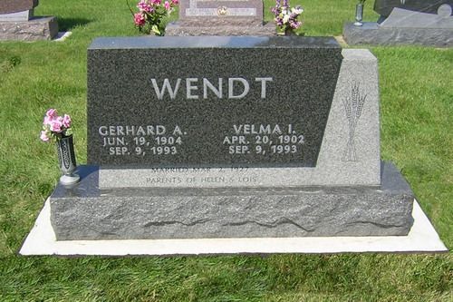 A granite headstone for the Wendt family, marking the dates for Gerhard A. and Velma I. Wendt, set in a grassy cemetery.