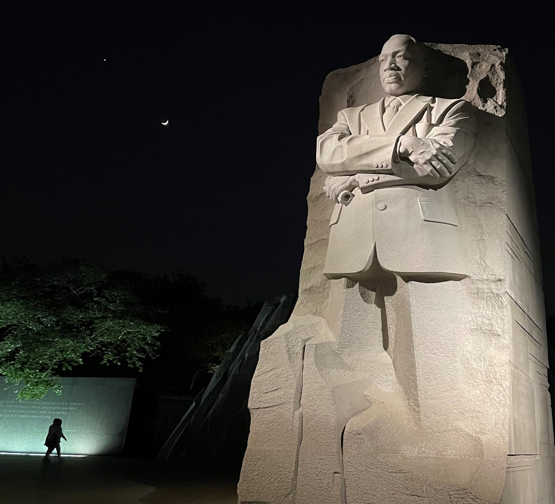 Photo of MLK memorial statue with arms crossed