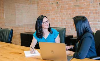 Lawyer talking to her client — S. Miami, FL — Sutton Law Group