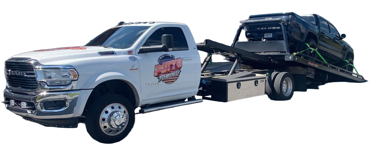 White tow truck hauling a black car on a flatbed trailer