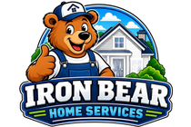 Cartoon bear mascot in overalls and cap with &ldquo;IRON BEAR HOME SERVICES&rdquo; logo and house background