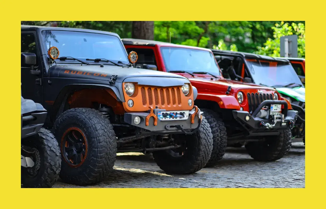 Jeep Wrangler Maintenance line with many different Jeeps