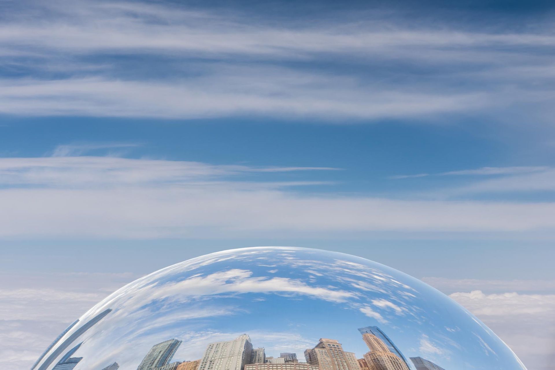 Chicago skyline reflected in the shiny surface of 