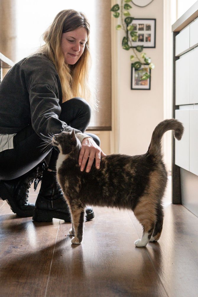 Luna Tailored Pet Care cuddletime with a cat