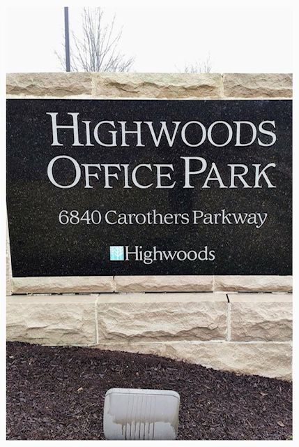 Sign for Highwoods Office Park at 6840 Carothers Parkway, with a Highwoods logo.