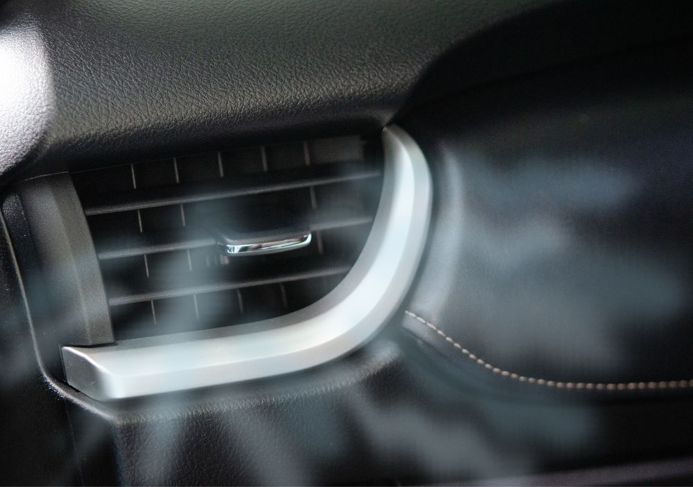 Cold air blowing from a car’s dashboard air vent