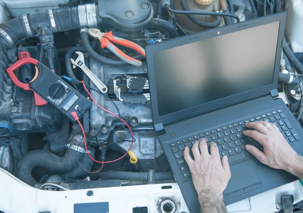 Mobile Mechanic Reading carrying out car diagnostics