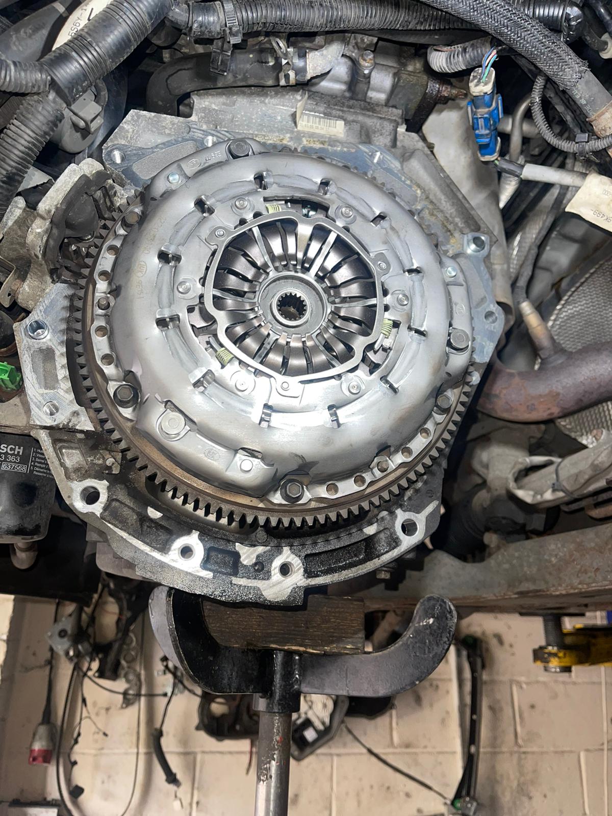 New clutch fitted to a Ford Focus during a clutch replacement